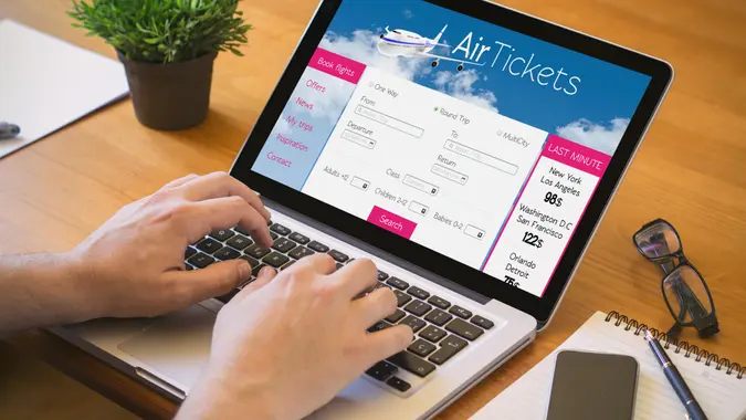 Travel, airline tickets, booking, laptop, reservation