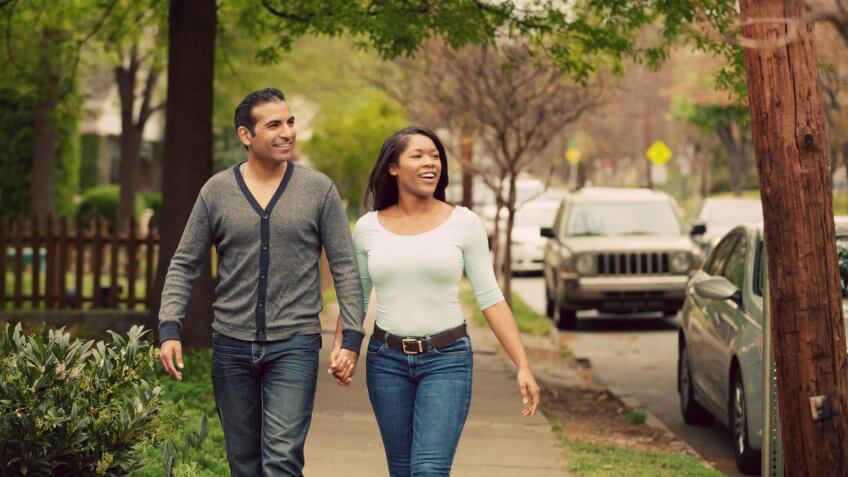 Young couple out in the neighborhood.