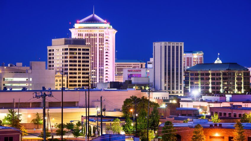 Montgomery, Alabama, USA downtown skyline at night.