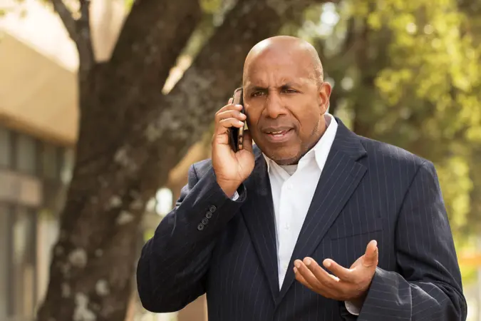African American businessman having a difficult conversation.