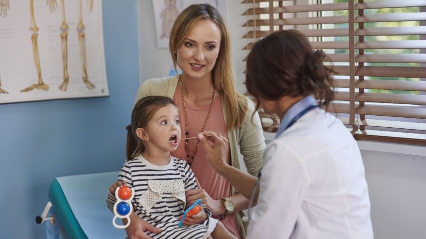 mom-and-daughter-at-doctors-sick