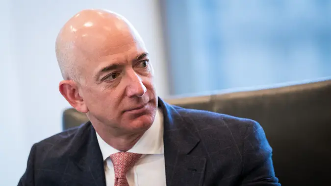 NEW YORK, NY - DECEMBER 14: Jeff Bezos, chief executive officer of Amazon, listens during a meeting of technology executives and President-elect Donald Trump at Trump Tower, December 14, 2016 in New York City.