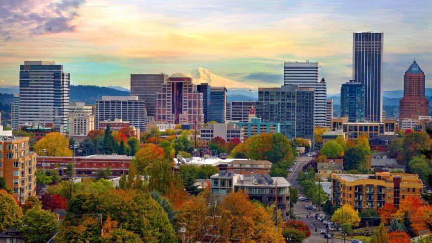 One beautiful Autumn day in Portland Oregon downtown from Vista Bridge with view of Mount Hood City Skyline and Trees with Fall Color Foliage.