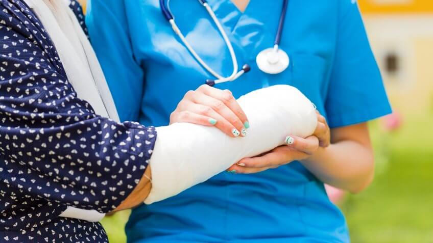 closeup-bandaged-hand-elderly-patient