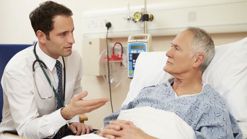 senior-man-in-hospital-bed