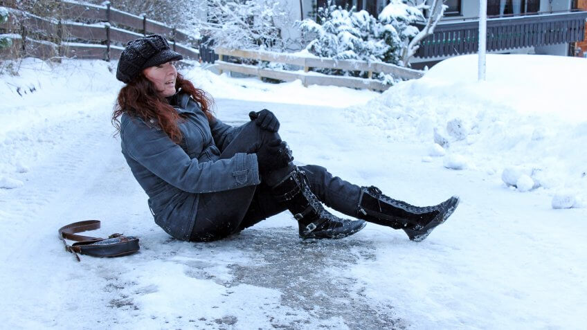 wintry-accident-on-smooth-streets-woman