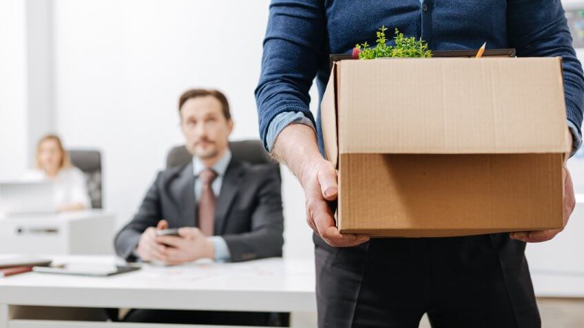 confident-employee-leaving-office-his-personal