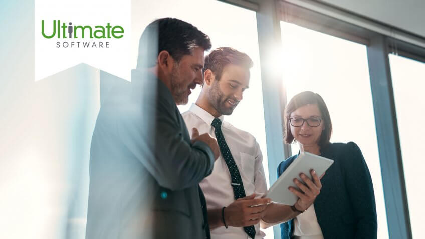 group-businesspeople-using-digital-tablet-together