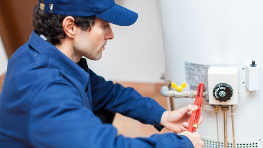 plumber-fixing-hotwater-heater