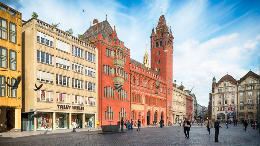Basel, Switzerland - May 30, 2013: View at the Basel Town Hall and the Marktplatz in the center of Basel.