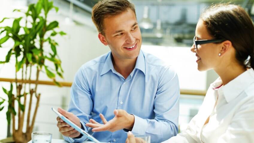 smiling-consultant-preferring-modern-technology-obsolete