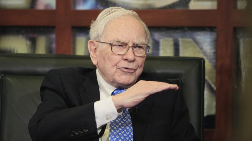 Mandatory Credit: Photo by Nati Harnik/AP/REX/Shutterstock (5933229a)Warren Buffett Warren Buffett, Chairman, President & CEO of Berkshire Hathaway, gestures during an interview with Liz Claman of the Fox Business Network, in Omaha, Neb.