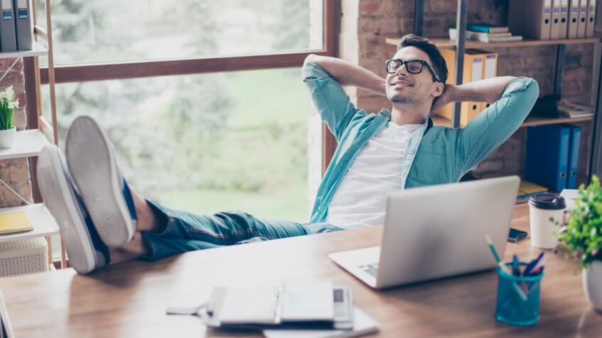 man having a rest after solving all the tasks at work