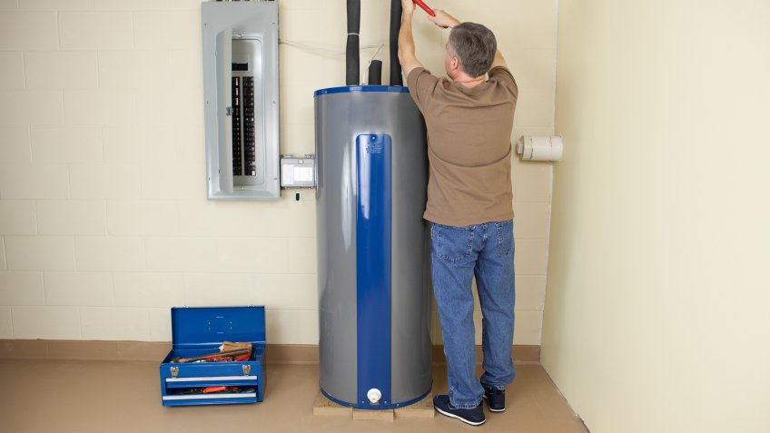 Plumber fixing Water Heater