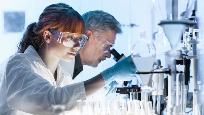 Health care researchers working in life science laboratory.