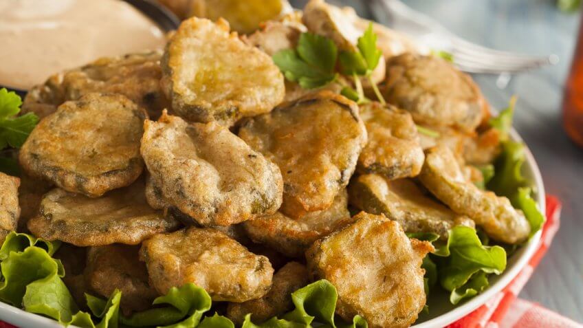 Delicious Battered Fried Pickles with Dipping Sauce.