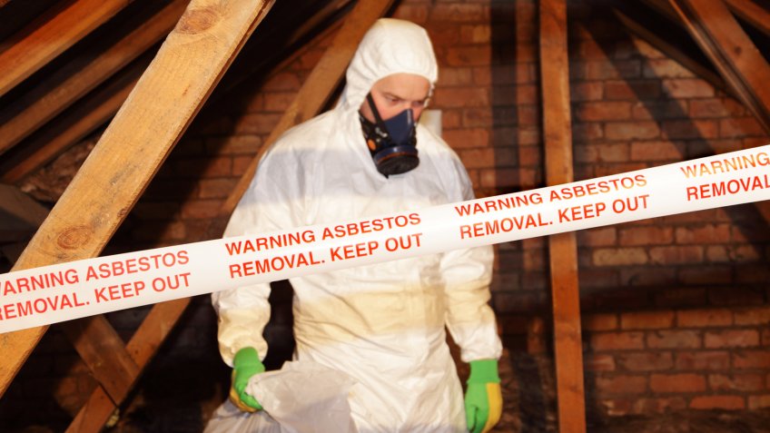 man removing asbestos