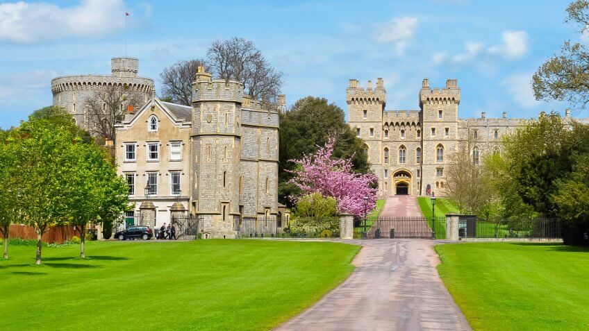 Long walk alley to Windsor castle in spring, London suburbs, UK.
