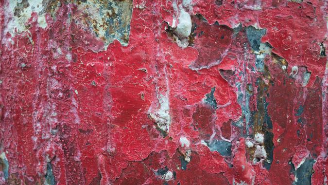 Red Cracked Paint on Wall