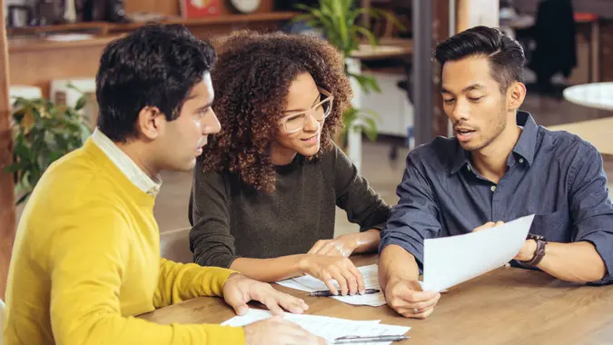 Couple on meeting with financial advisor.