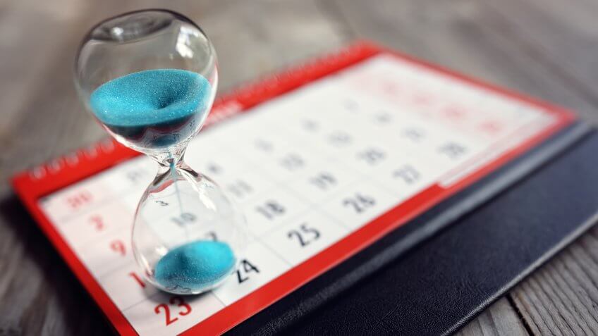 Hour glass on calendar