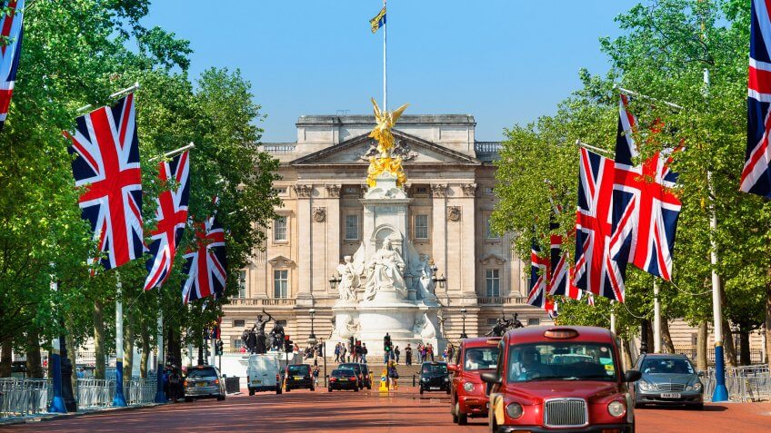 London - England - August 20, 2016: Traffic in London with Buckingham Palace in background.