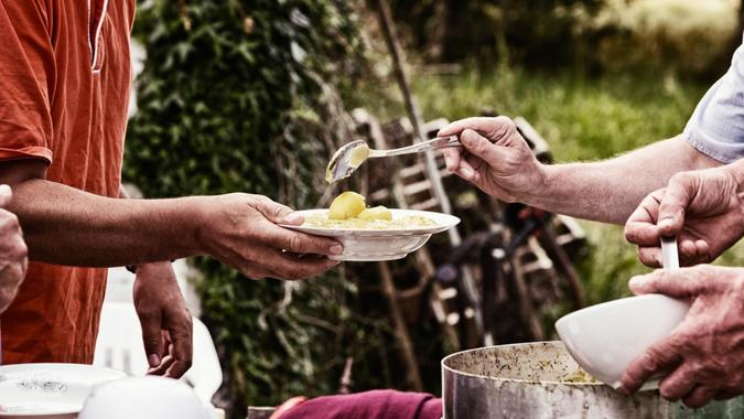 soup kitchen serving food for poor people