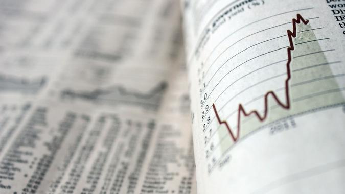 Newspaper with stock chart