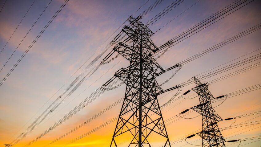 Electric power lines at sunset.