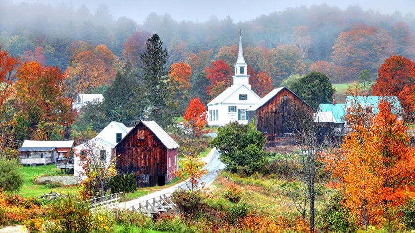 Peak autumn foliage near rural Waits River in Vermont.