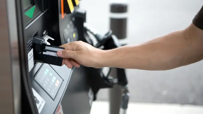 "paying for gas, small DOF.