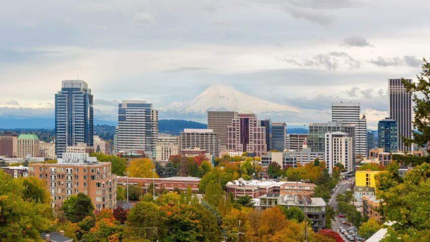 Portland Oregon downtown city skyline and snow covered Mount Hood view in Fall Season America.