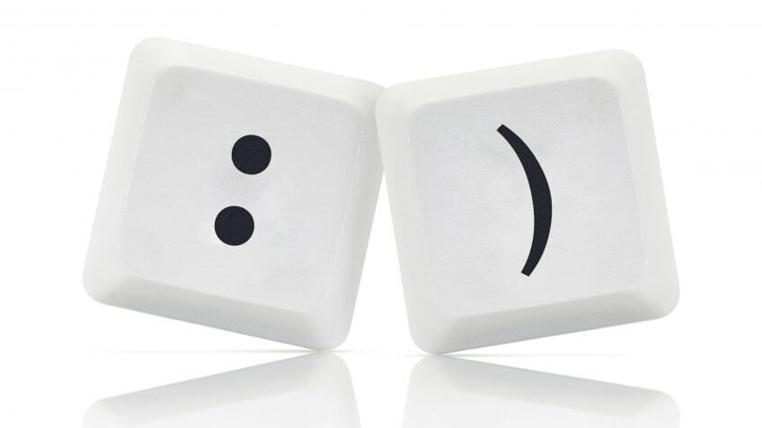 Computer Keys with social media smile symbol.