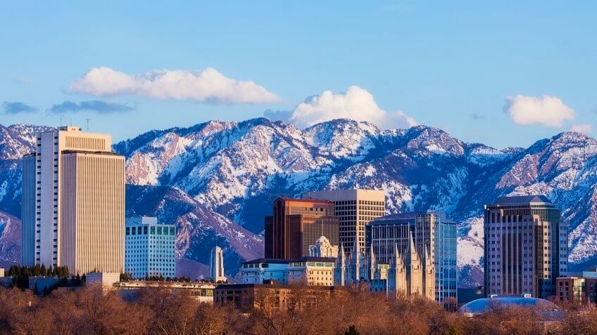 Skyline of Salt Lake City, Utah, USA in early spring as the sun sets.