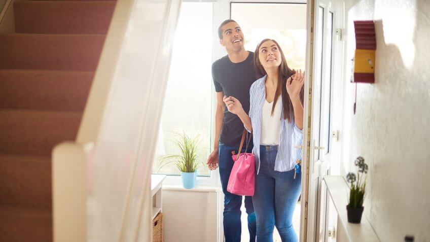 a young couple view a property .