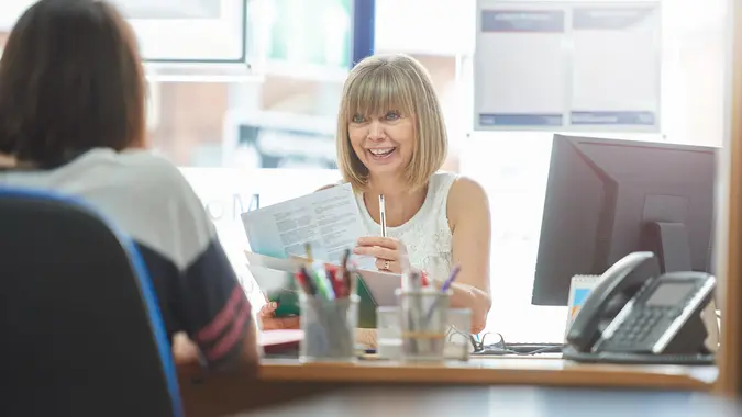 Businesswoman in meeting with customer in the office.