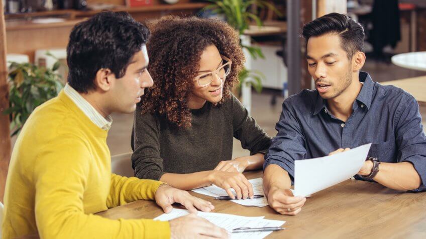 Couple on meeting with financial advisor.