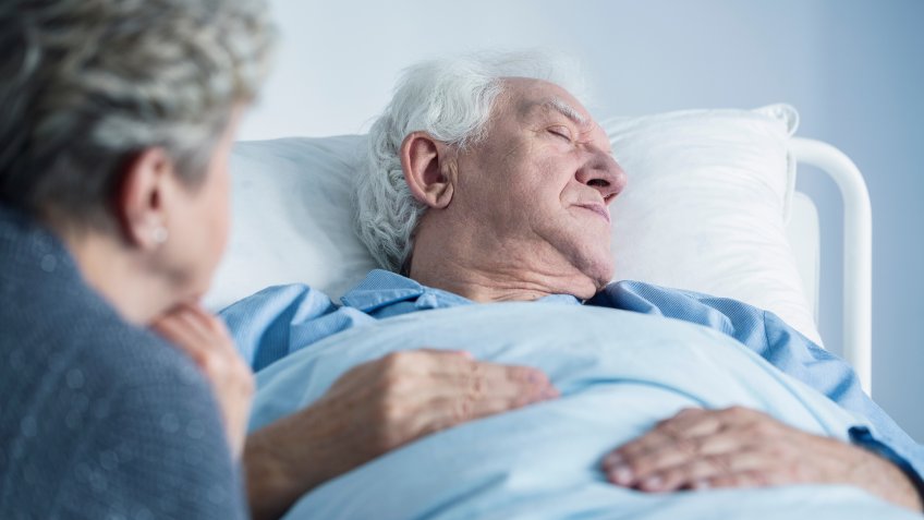 senior-man-in-hospital-bed