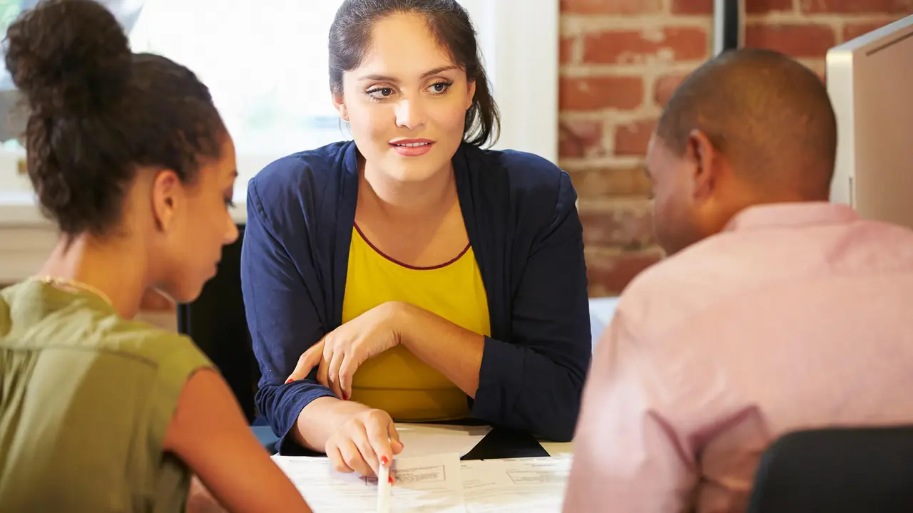 Couple Meeting With Financial Adviser
