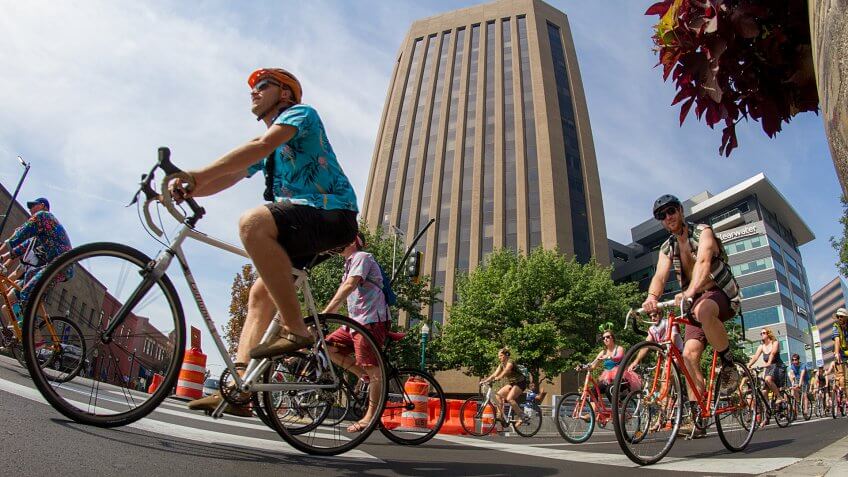 BOISE, IDAHO/USA - AUGUST 13, 2016: Group of bikers taking the corner during the Tour De Fat Bike Parade in Boise, Idaho.