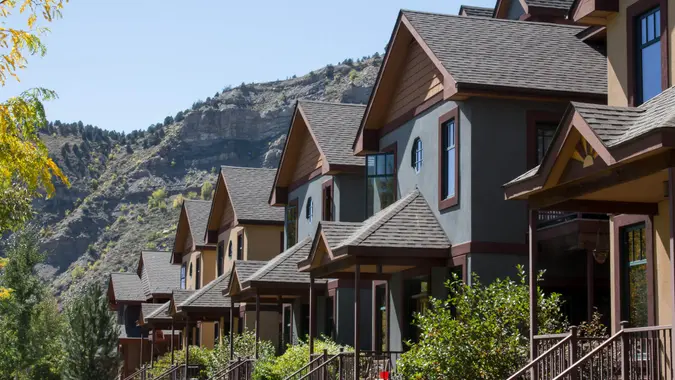 Image of the front porches on a row of condominiums in historic downtown Durango, Colorado.