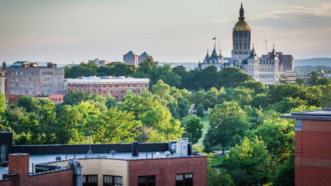 View of buildings and the Connecticut State Capitol Building in Hartford, Connecticut.