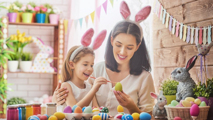 mother-and-daughter-painting-easter-eggs