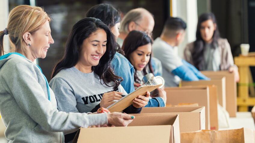 people volunteering at food bank