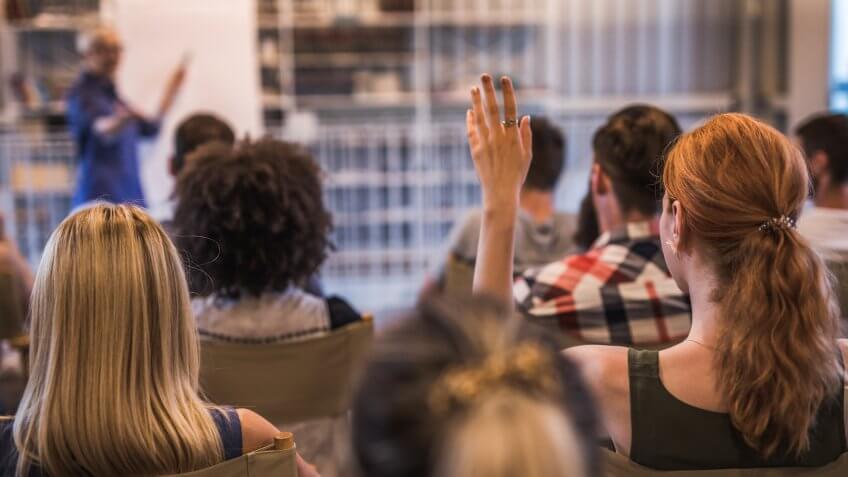 large group of business people on a seminar in a board room