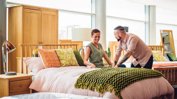 couple shopping in a furniture store