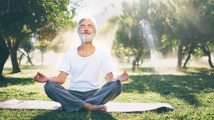 senior retired meditating
