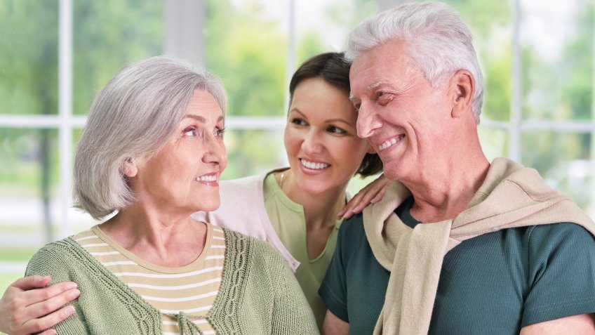 senior parents with daughter