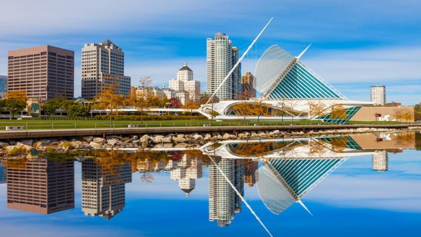 Skyscrapers skyline of Milwukee and reflections in Lake Michigan, WI.