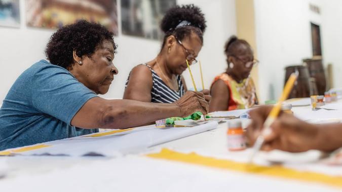 senior woman painting